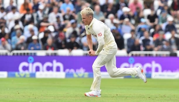 Sam Curran of England runs into bowl during day two of the First Test Match between England and India at Trent Bridge on August 05, 2021 in...