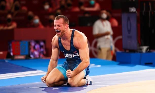 David Morris Taylor III of Team United States celebrates his victory over Hassan Yazdanicharati of Team Iran during the Men's Freestyle 86kg Final on...