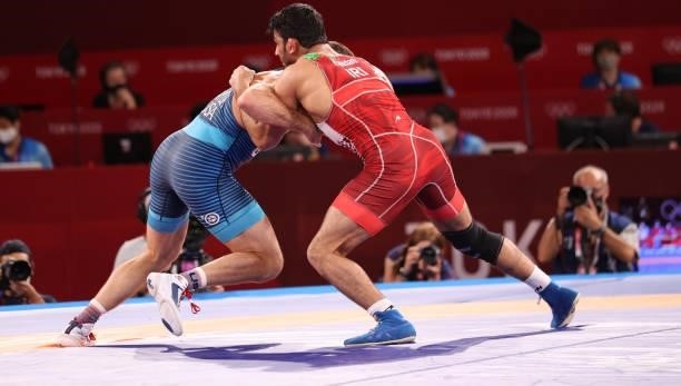David Morris Taylor III of Team United States competes against Hassan Yazdanicharati of Team Iran during the Men's Freestyle 86kg Final on day...