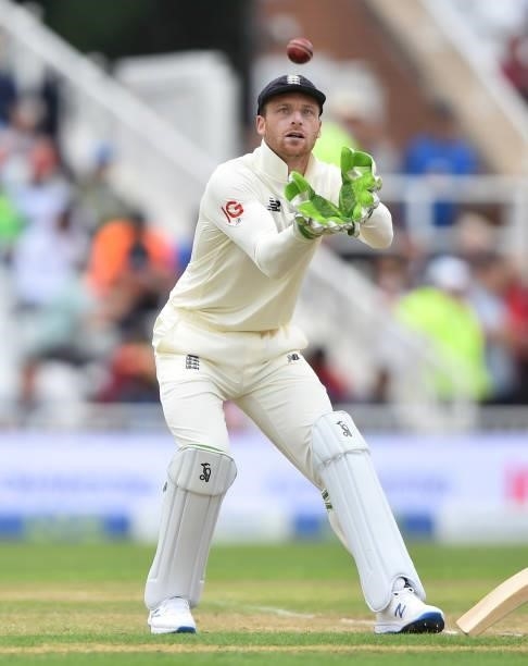 Jos Buttler of England catches the ball during day two of the First Test Match between England and India at Trent Bridge on August 05, 2021 in...
