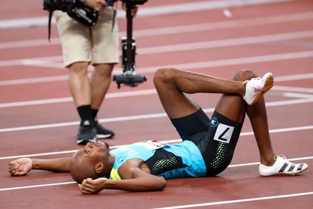 Steven Gardiner of Team Bahamas reacts after winning the gold medal in the Men's 400m Final on day thirteen of the Tokyo 2020 Olympic Games at...