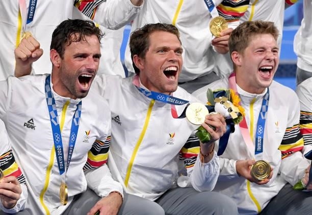 Vincent Vanasch of Belgium and team mates celebrate victory after the gold medal final match between Australia and Belgium on day thirteen of the...