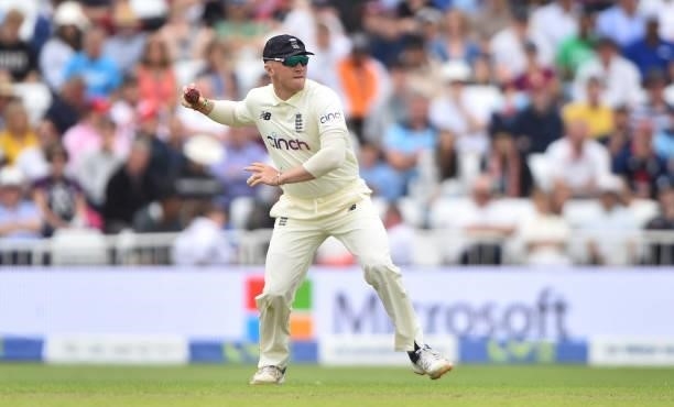 Dom Bess of England throws the ball during day two of the First Test Match between England and India at Trent Bridge on August 05, 2021 in...