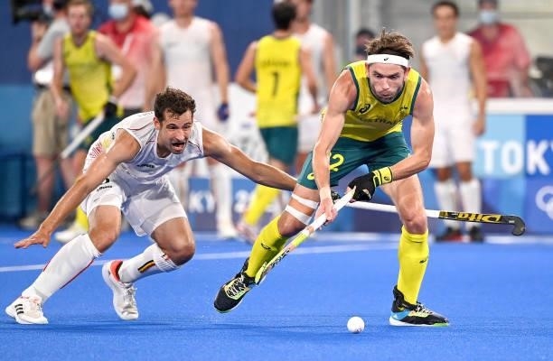 Andrew Ogilvie of Australia breaks away from the defence during the gold medal final match between Australia and Belgium on day thirteen of the Tokyo...