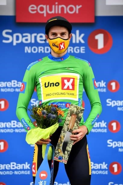 Markus Hoelgaard of Norway and UNO - X Pro Cycling Team Green Points Jersey celebrates at podium as stage winner during the 8th Arctic Race Of Norway...