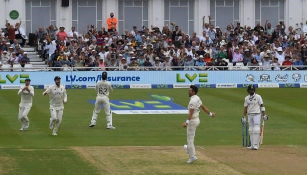James Anderson of England celebrates after dismissing Virat Kohli of India first ball during the 1st LV= Test match between England and India at...