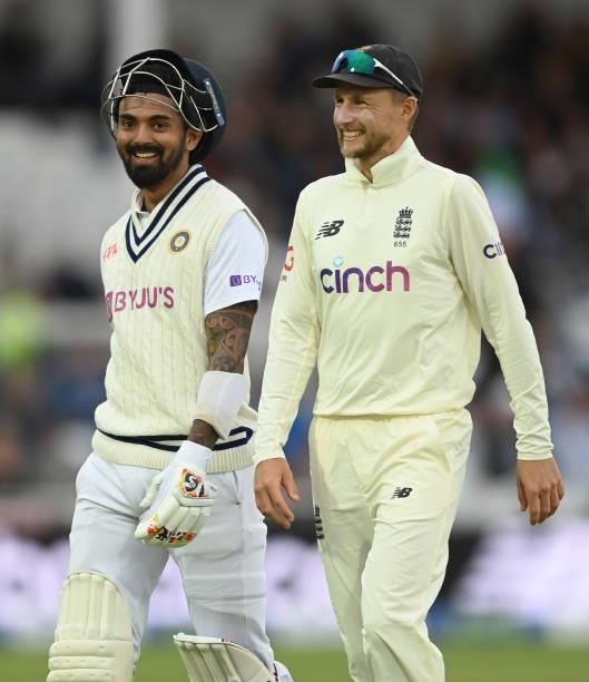 Joe Root of England walks off the field with KL Rahul of India during the 1st LV= Test match between England and India at Trent Bridge on August 05,...