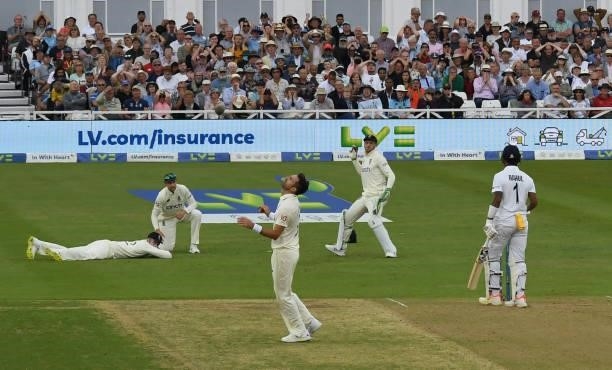 James Anderson of England reacts after Dom Sibley dropped KL Rahul of India during the 1st LV= Test match between England and India at Trent Bridge...