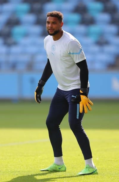 Zack Steffen of Manchester City looks on during the warm up prior to a pre-season match between Manchester City and Blackpool at Manchester City...