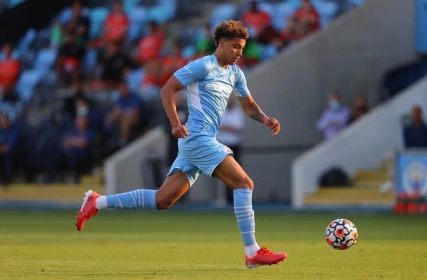 Morgan Rogers of Manchester City chases the ball during pre-season match between Manchester City and Blackpool at Manchester City Football Academy on...