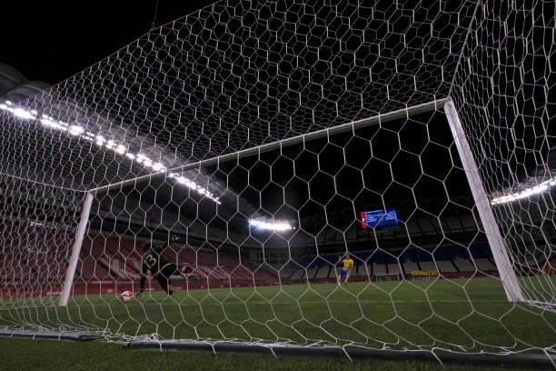 Reinier of Team Brazil makes the winning penalty kick during the penalty shoot out in the Men's Football Semi-final match between Mexico and Brazil...