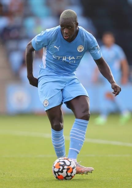 Benjamin Mendy of Manchester City passes the ball during a pre-season match between Manchester City and Blackpool at Manchester City Football Academy...