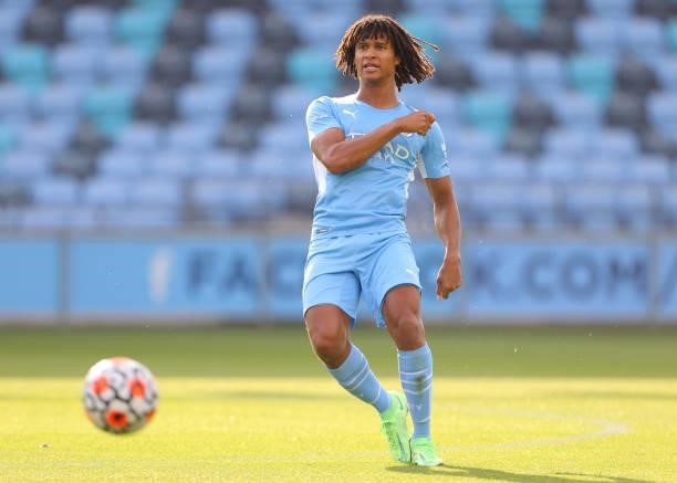 Nathan Ake of Manchester City passes the ball during pre-season match between Manchester City and Blackpool at Manchester City Football Academy on...
