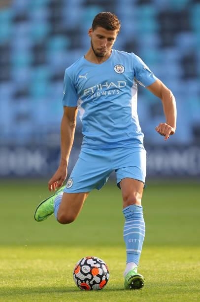 Ruben Dias of Manchester City passes the ball during pre-season match between Manchester City and Blackpool at Manchester City Football Academy on...