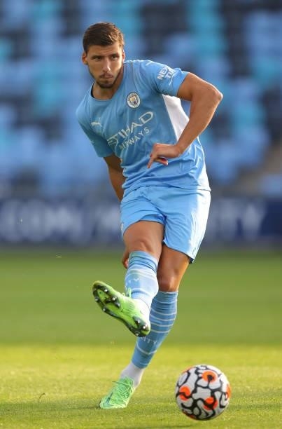 Ruben Dias of Manchester City passes the ball during pre-season match between Manchester City and Blackpool at Manchester City Football Academy on...