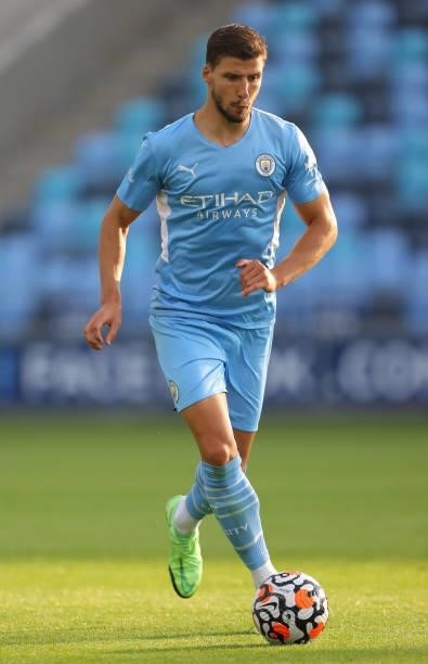 Ruben Dias of Manchester City runs with the ball during pre-season match between Manchester City and Blackpool at Manchester City Football Academy on...