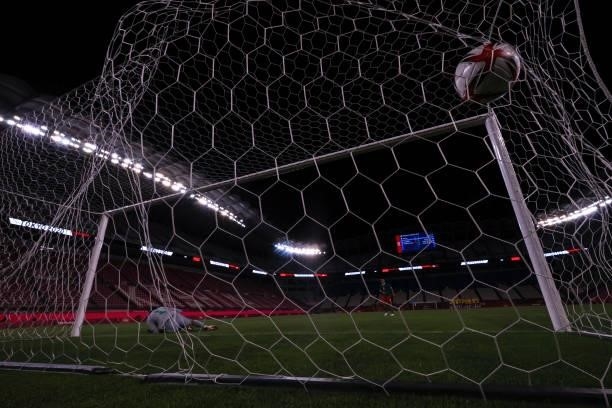 Bruno Guimaraes of Team Mexico succeeds penalty kick at the penalty shoot out during the Men's Football Semi-final match between Mexico and Brazil on...