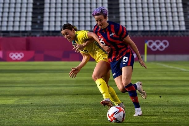Hayley Raso of Australia and Megan Rapinoe of the United States during the Tokyo 2020 Olympic Womens Football Tournament Bronze Medal match between...
