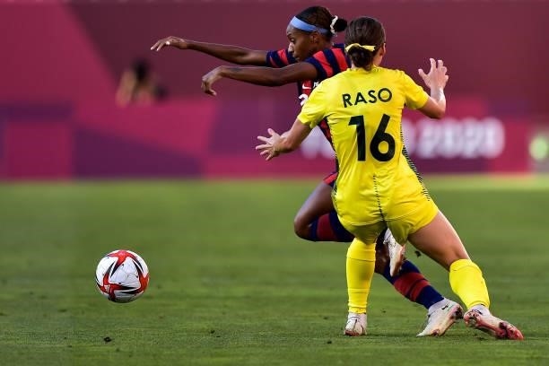 Crystal Dunn of the United States and Hayley Raso of Australia during the Tokyo 2020 Olympic Womens Football Tournament Bronze Medal match between...