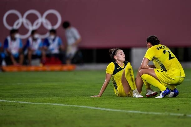 Stephanie Catley of Australia and Sam Kerr of Australia look dejected during the Tokyo 2020 Olympic Womens Football Tournament Bronze Medal match...