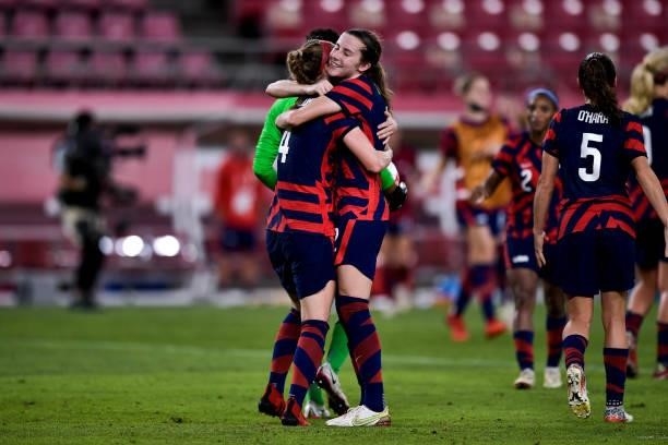 Becky Sauerbrunn of the United States and Tierna Davidson of the United States celebrate victory during the Tokyo 2020 Olympic Womens Football...