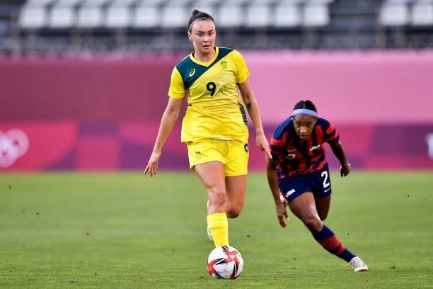 Caitlin Foord of Australia controls the ball under pressure of Crystal Dunn of the United States during the Tokyo 2020 Olympic Womens Football...