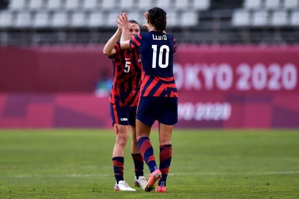 Carli Lloyd of the United States celebrates with Kelley O'Hara of the United States after scoring her team third goal during the Tokyo 2020 Olympic...