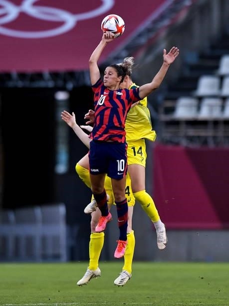 Carli Lloyd of the United States fights for a headded ball with Alanna Kennedy of Australia during the Tokyo 2020 Olympic Womens Football Tournament...