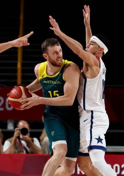 Nic Kay of Australia, Devin Booker of USA during the Men's Semifinal Basketball game between United States and Australia on day thirteen of the Tokyo...