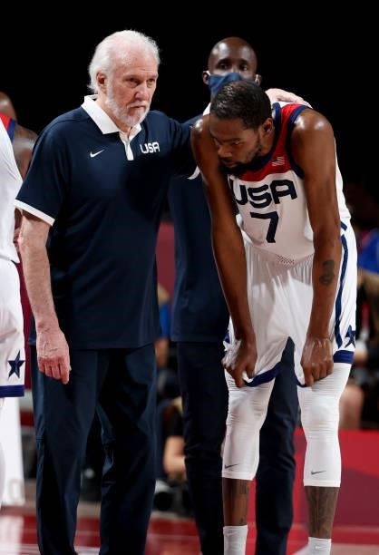 Coach of Team USA Gregg Popovich talks to Kevin Durant of USA during the Men's Semifinal Basketball game between United States and Australia on day...