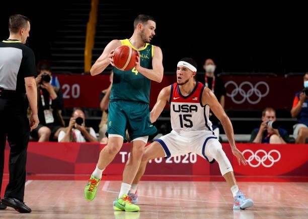 Chris Goulding of Australia, Devin Booker of USA during the Men's Semifinal Basketball game between United States and Australia on day thirteen of...