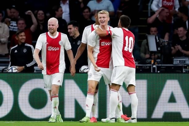 Perr Schuurs of Ajax celebrates with Dusan Tadic of Ajax after scoring his sides second goal during the Pre-season Friendly match between Ajax and...