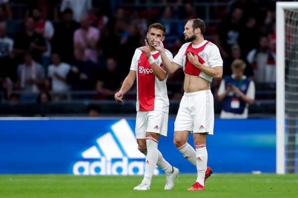 Dusan Tadic of Ajax and Daley Blind of Ajax during the Pre-season Friendly match between Ajax and Leeds United at the Johan Cruijff ArenA on August...