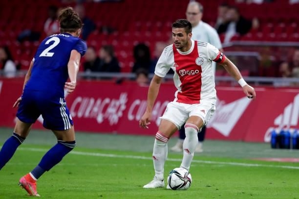 Luke Ayling of Leeds United and Dusan Tadic of Ajax during the Pre-season Friendly match between Ajax and Leeds United at the Johan Cruijff ArenA on...