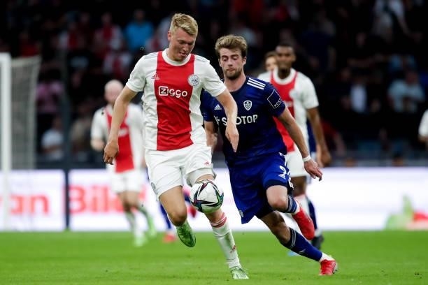 Perr Schuurs of Ajax and Patrick Bamford of Leeds United during the Pre-season Friendly match between Ajax and Leeds United at the Johan Cruijff...
