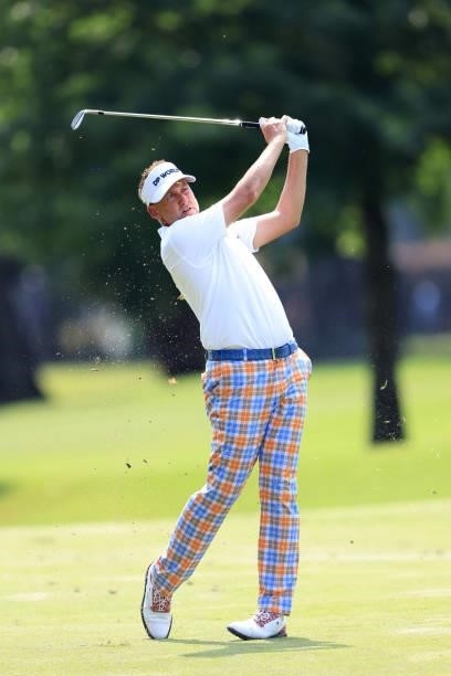 Ian Poulter of England plays a shot on the ninth hole during the first round of the World Golf Championship-FedEx St Jude Invitational at TPC...