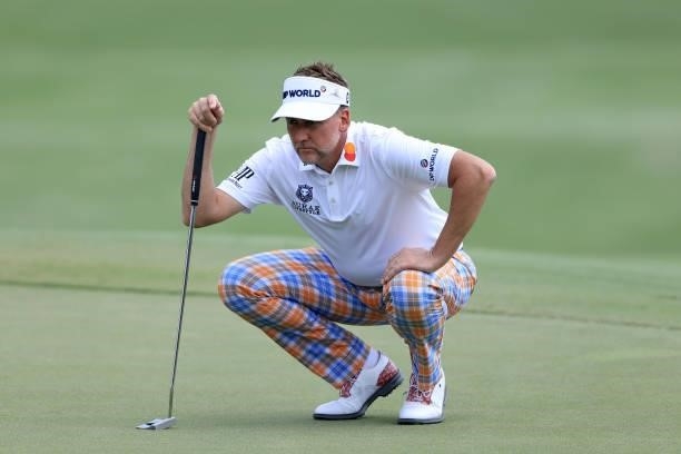 Ian Poulter of England plays a shot on the sixth hole during the first round of the World Golf Championship-FedEx St Jude Invitational at TPC...