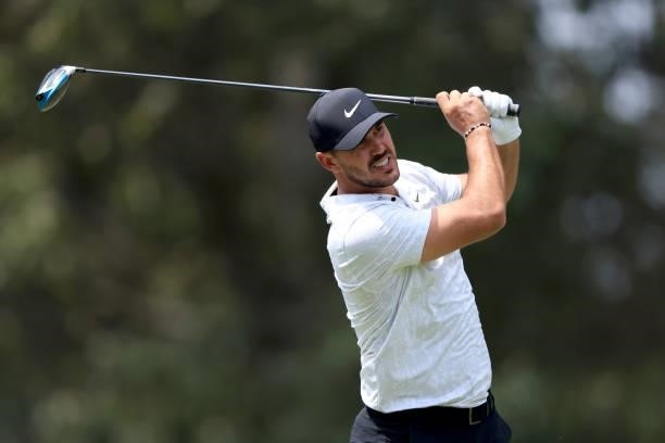 Brooks Koepka plays a shot on the seventh hole during the first round of the World Golf Championship-FedEx St Jude Invitational at TPC Southwind on...