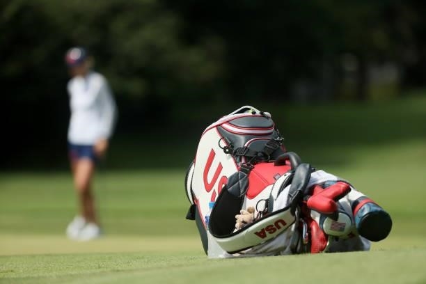 Nelly Korda of Team United States stands on the 17th green as her bag is seen during the third round of the Women's Individual Stroke Play on day...