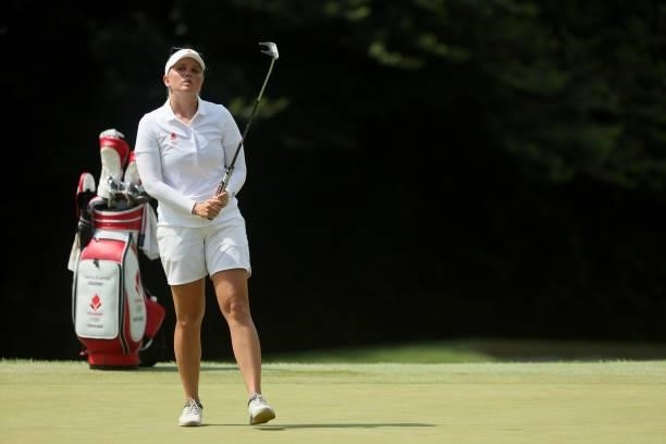 Nanna Koerstz Madsen of Team Denmark reacts to her putt on the 17th green during the third round of the Women's Individual Stroke Play on day...