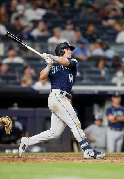 Jarred Kelenic of the Seattle Mariners follows through on his seventh inning home run against the New York Yankees at Yankee Stadium on August 05,...