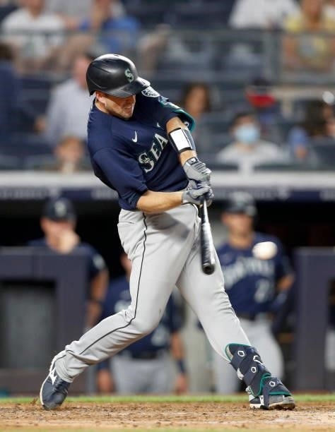 Tom Murphy of the Seattle Mariners singles in the fourth inning against the New York Yankees at Yankee Stadium on August 05, 2021 in New York City....