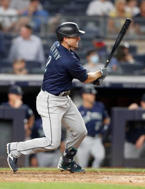 Tom Murphy of the Seattle Mariners singles in the fourth inning against the New York Yankees at Yankee Stadium on August 05, 2021 in New York City....