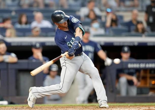 Mitch Haniger of the Seattle Mariners in action against the New York Yankees at Yankee Stadium on August 05, 2021 in New York City. The Yankees...
