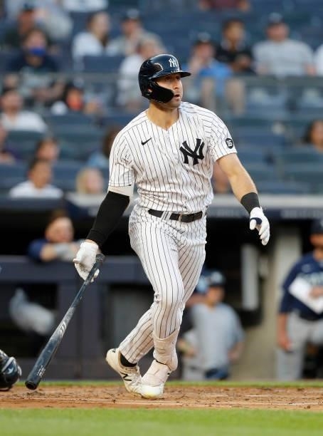 Joey Gallo of the New York Yankees follows through on a double in the second inning against the Seattle Mariners at Yankee Stadium on August 05, 2021...