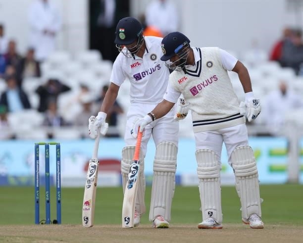Kannaur Rahul and Rishabh Pant of India check the wicket during day three of the First LV= Insurance test match between England and India at Trent...