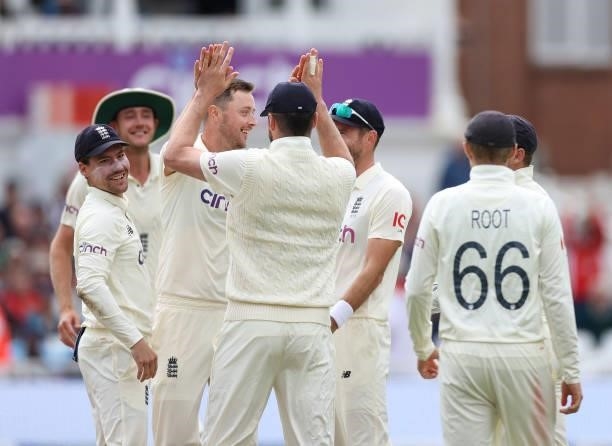 Ollie Robinson of England celebrates taking the wicket of Rishabh Pant of India during day three of the First LV= Insurance test match between...