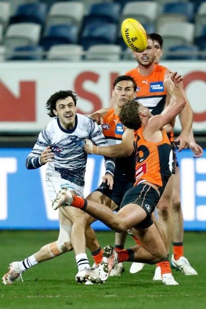 Harry Perryman of the Giants attempts to mark the ball during the round 21 AFL match between Geelong Cats and Greater Western Sydney Giants at GMHBA...