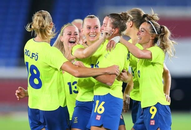 Stina Blackstenius of Team Sweden celebrates with teammates Fridolina Rolfo, Filippa Angeldal and Kosovare Asllani after scoring their team's first...