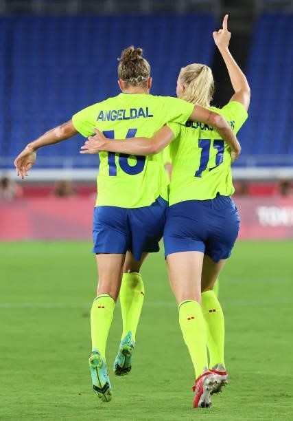 Stina Blackstenius of Team Sweden celebrates with teammate Filippa Angeldal after scoring a goal to take a 1-0 lead during the women's football gold...